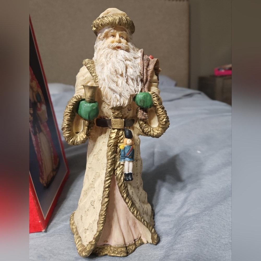 Vintage Santa Claus Figurine with Green Accents